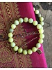 Peridot - 10 mm - round - zirconia pearl