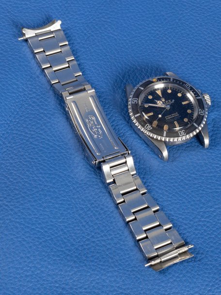 Rolex SOLD-Rolex Submariner reference 5512 from 1965 with a gilt four liner dial