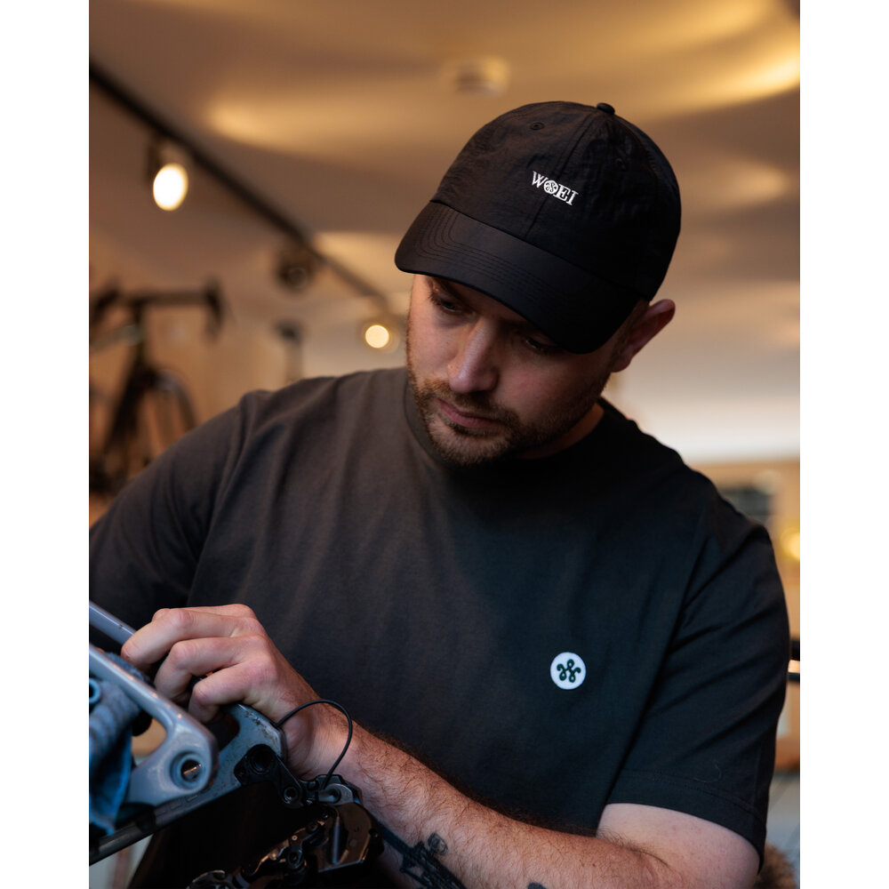 WOEI 6 PANEL TECHNICAL SCRIPT CAP ‘BLACK’