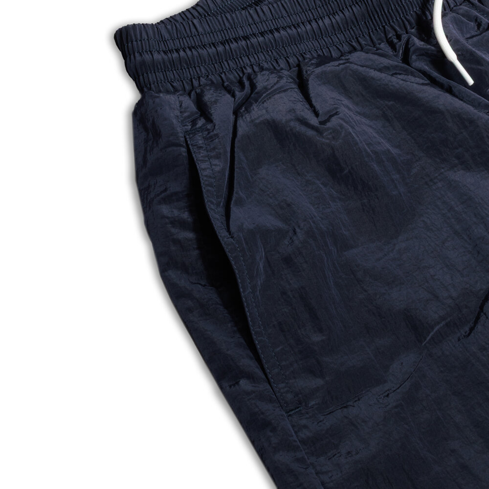 WOEI PATCH SHINY NYLON SWIM SHORT ‘NAVY BLAZE