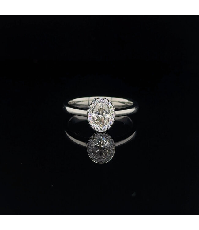 W. de Vaal Ring 19 karaat Ultra witgoud met Champagne diamant 0.58