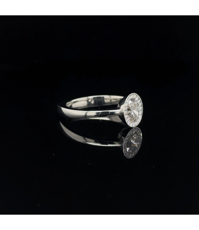 W. de Vaal Ring 19 karaat Ultra witgoud met Champagne diamant 0.58