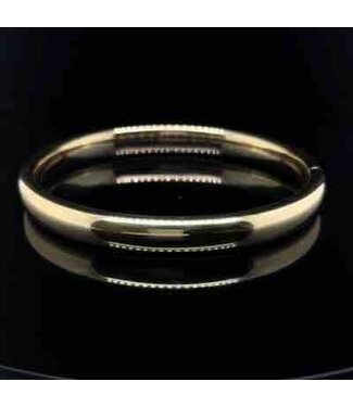 Hollow 14-karat yellow gold bangle, 60.83 mm diameter