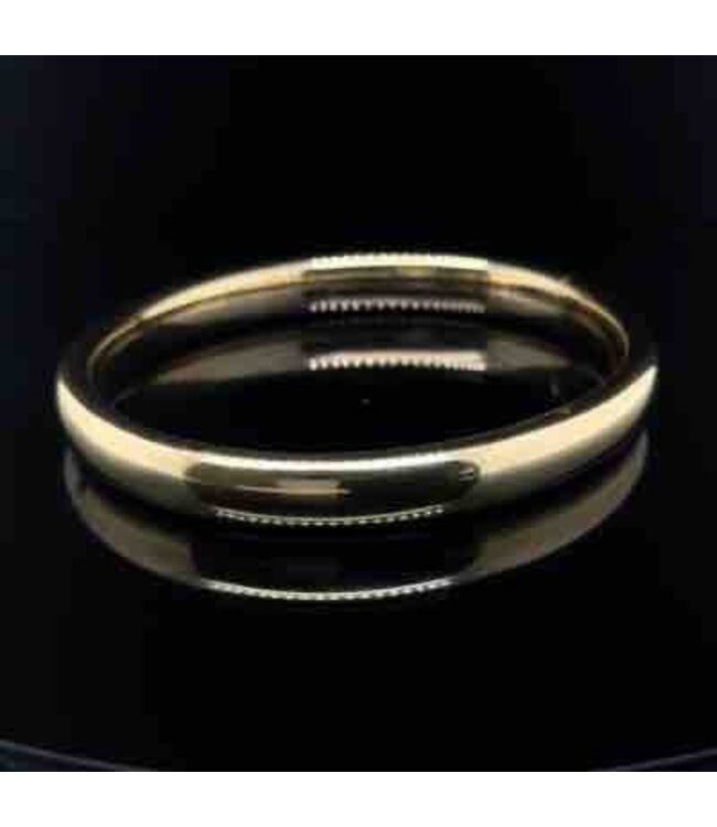 Hollow 14-karat yellow gold bangle, 60.83 mm diameter