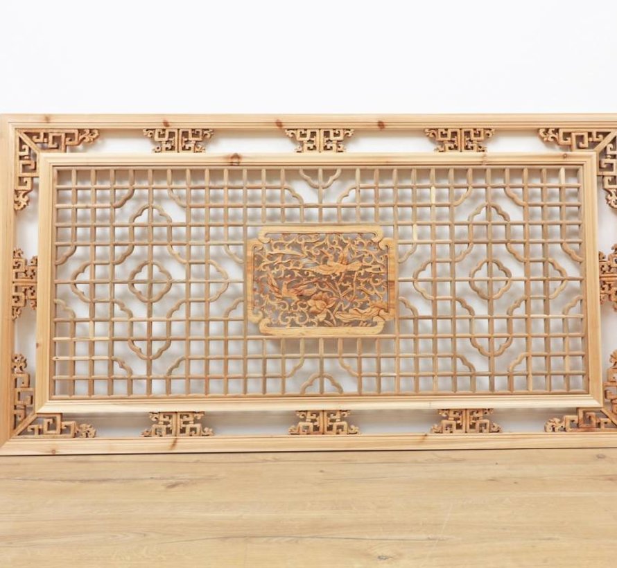 Classic wood carvings with floral and geometrical motives