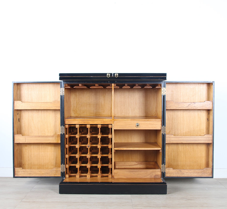 Minibar a small wine cabinet open is a bar black