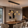 Hotel chique hanglamp Belluno 5-Lichts goud en amber glas