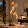 Japandi hanglamp Cambio 6-lichts getrapt zand met amber glas