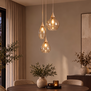 Hotel chique hanglamp Cambio 3-lichts getrapt zand met amber glas
