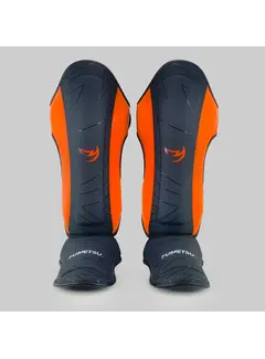 Fumetsu Fumetsu Icon Thaise scheenbeschermers Zwart/Oranje