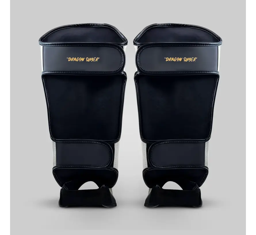 Fumetsu Dragon Slayer scheenbeschermers wit/zwart/goud