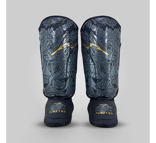 Fumetsu Fumetsu Dragon Slayer scheenbeschermers zwart/goud
