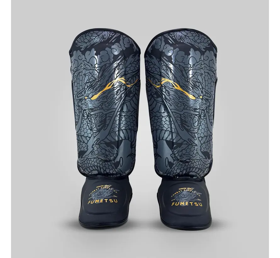 Fumetsu Dragon Slayer scheenbeschermers zwart/goud