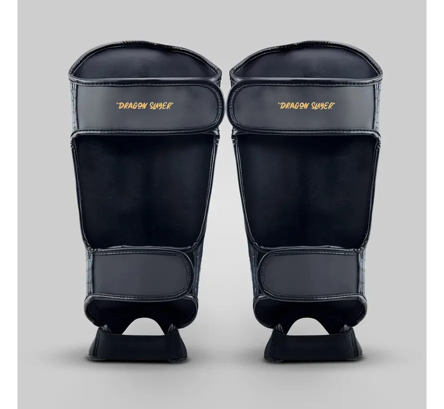 Fumetsu Dragon Slayer scheenbeschermers zwart/goud