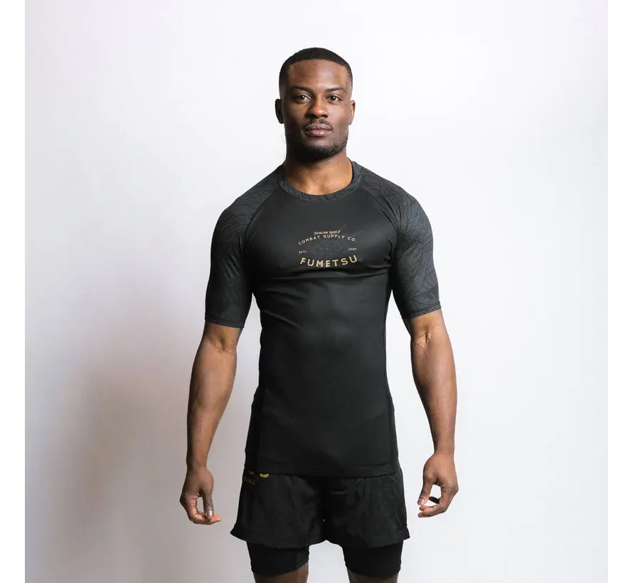 Fumetsu Dragon Slayer rashguard met korte mouwen, zwart/goud