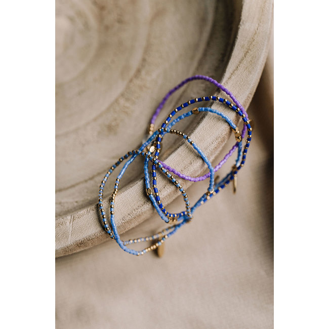 By Shir Armband kraaltjes Pauw Blauw glim om en om
