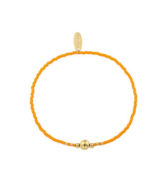 By Shir Armband kraaltjes oranje dot