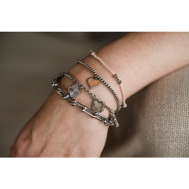 By Shir Armband kraaltjes hartje Daisy poeder roze