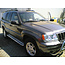 Jeep Cherokee Sidebars met aluminium trede