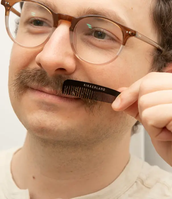 Kikkerland mini mustache comb