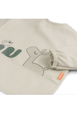Done by Deer Sleeved pocket bib Lalee Sand Done by Deer Sleeved pocket bib Lalee Sand