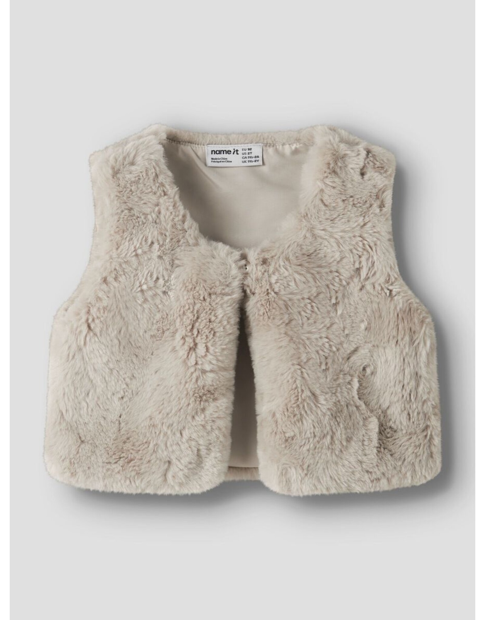 Name it NMFNANIS FAKE FUR VEST Peyote