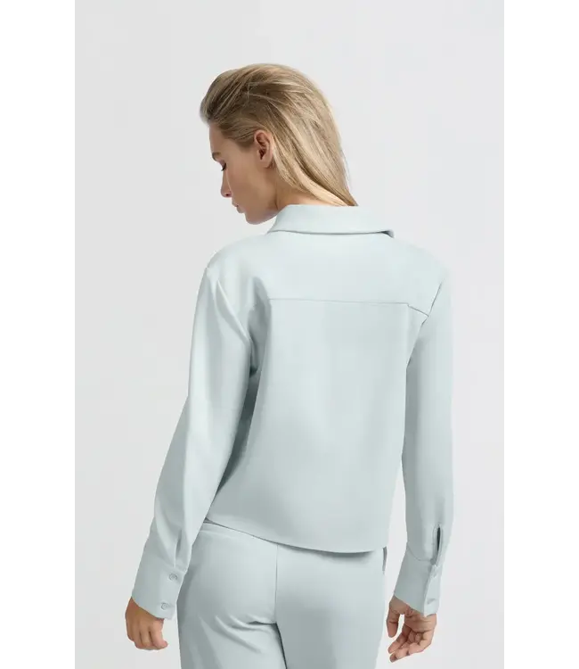 Cropped blouse with chest pocket