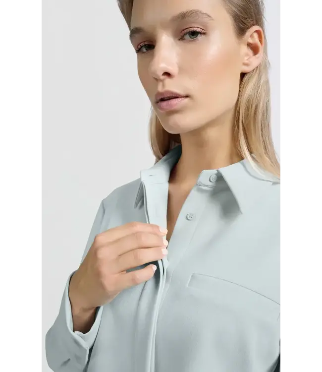 Cropped blouse with chest pocket