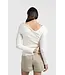Fitted sweater with crossed shoulders