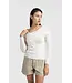 Fitted sweater with crossed shoulders