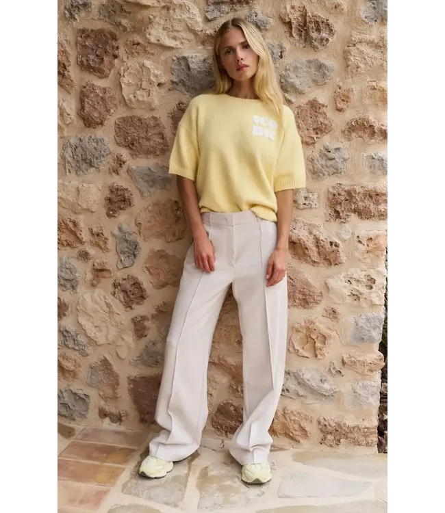 Trousers with stitched details