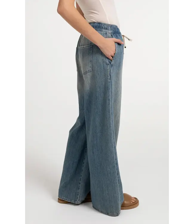 Denim trousers with cord