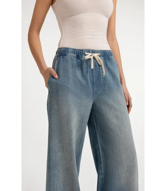 Denim trousers with cord