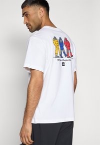 The North Face M' Celebration Relaxed T-Shirt - TNF White