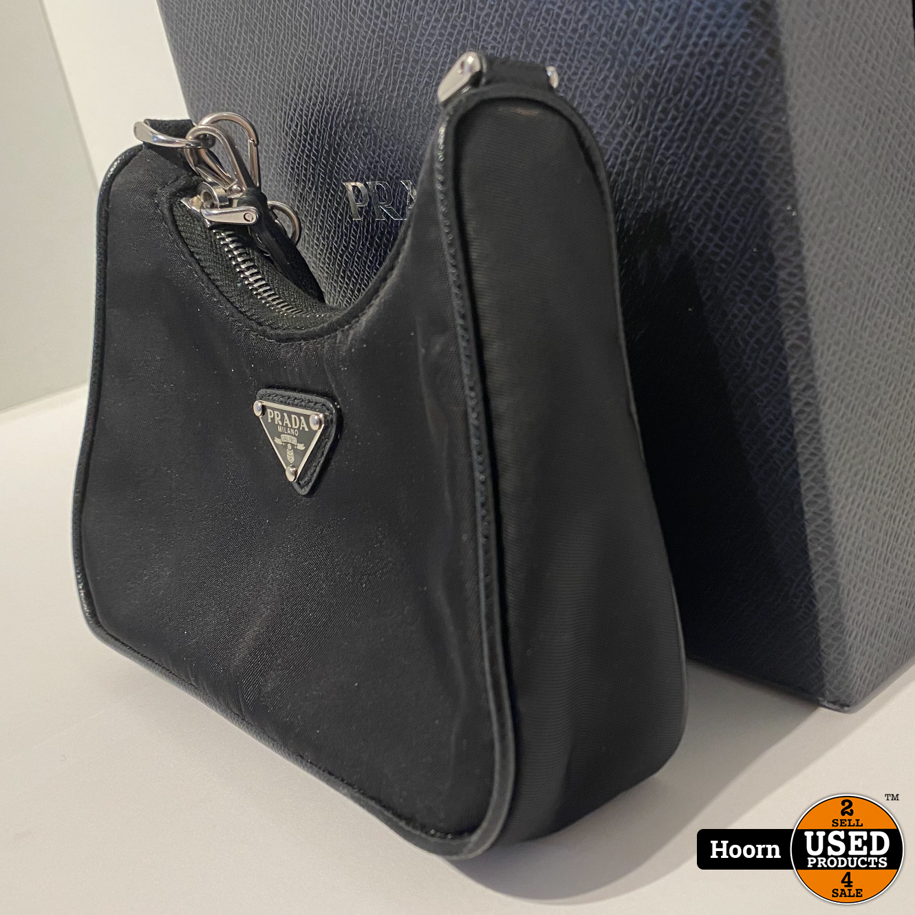 prada re edition nylon mini bolsa