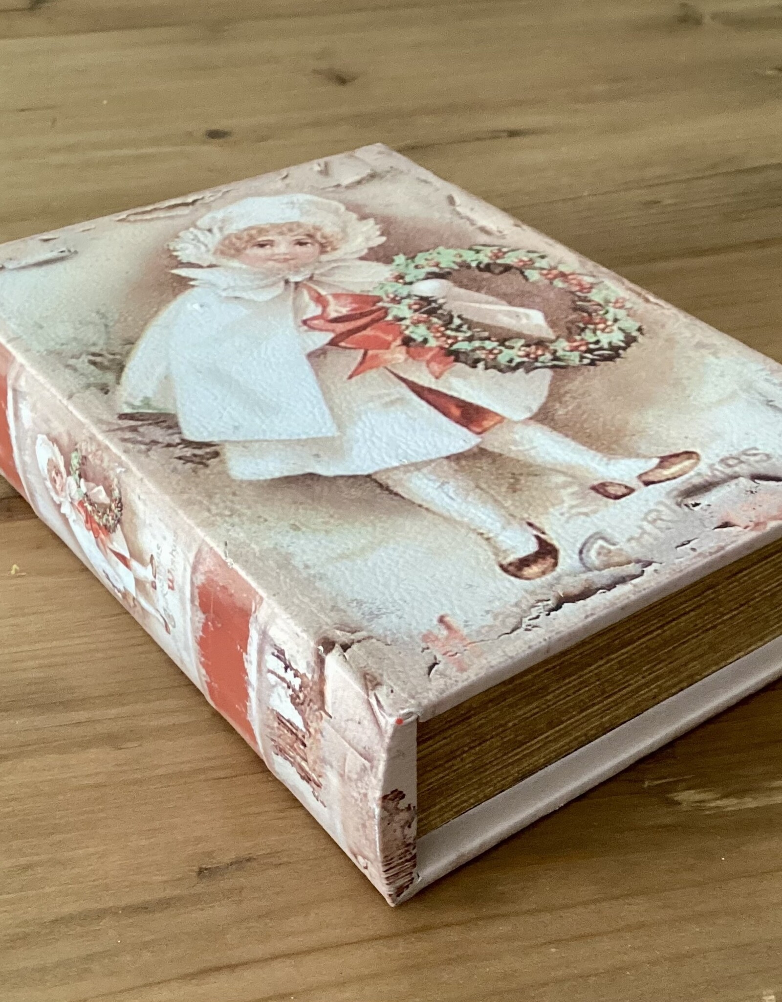 Aufbewahrungsbox in Buchform  "Mädchen mit Kranz“