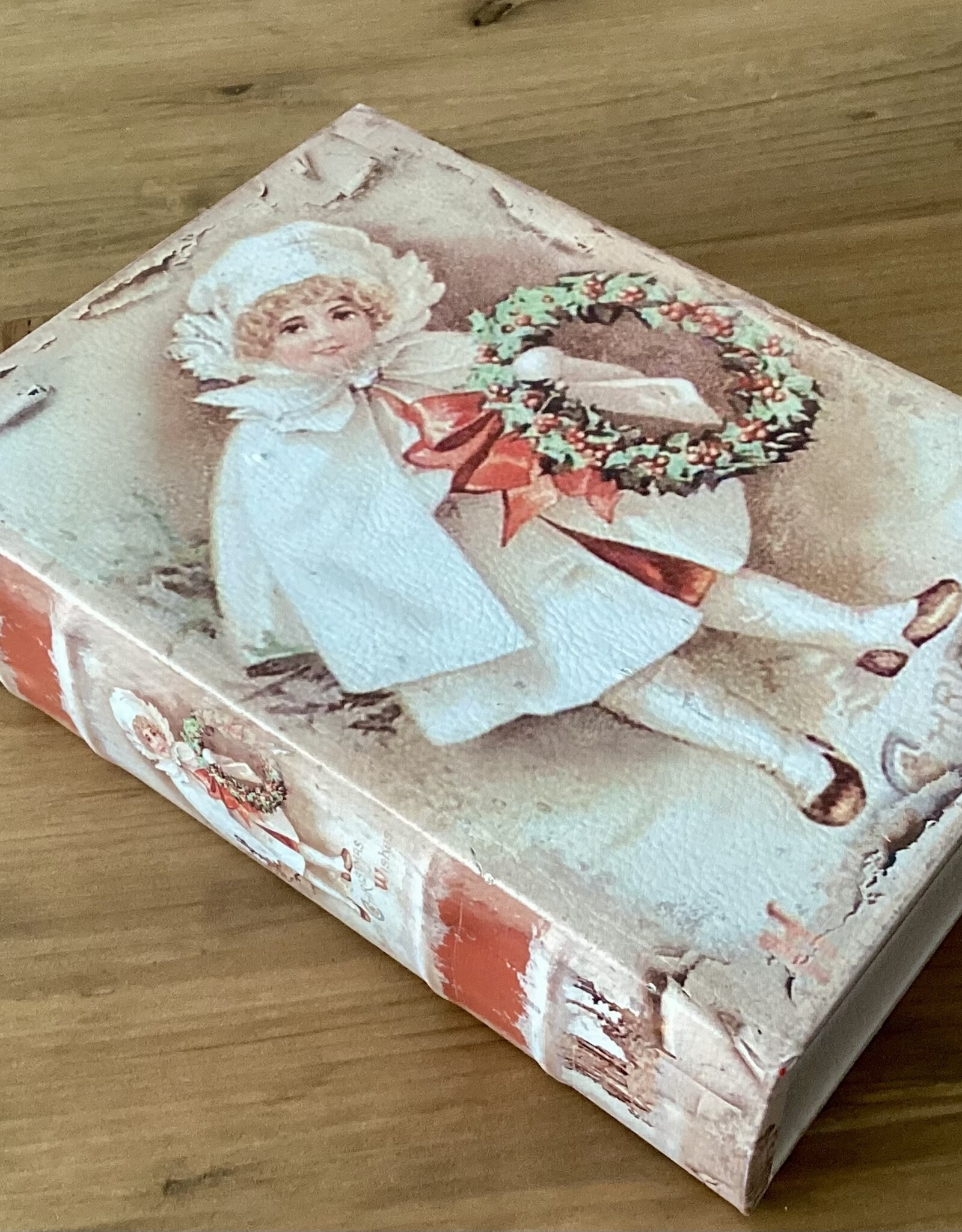 Aufbewahrungsbox in Buchform  "Mädchen mit Kranz“