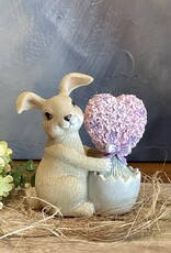 Konijntje met een hart van roze bloemen