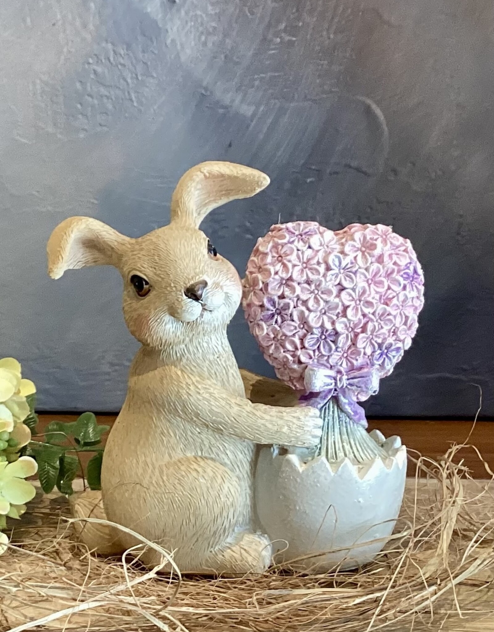 Lapin au coeur de fleurs roses