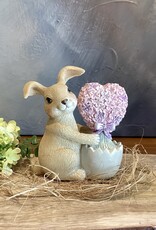 Lapin au coeur de fleurs roses