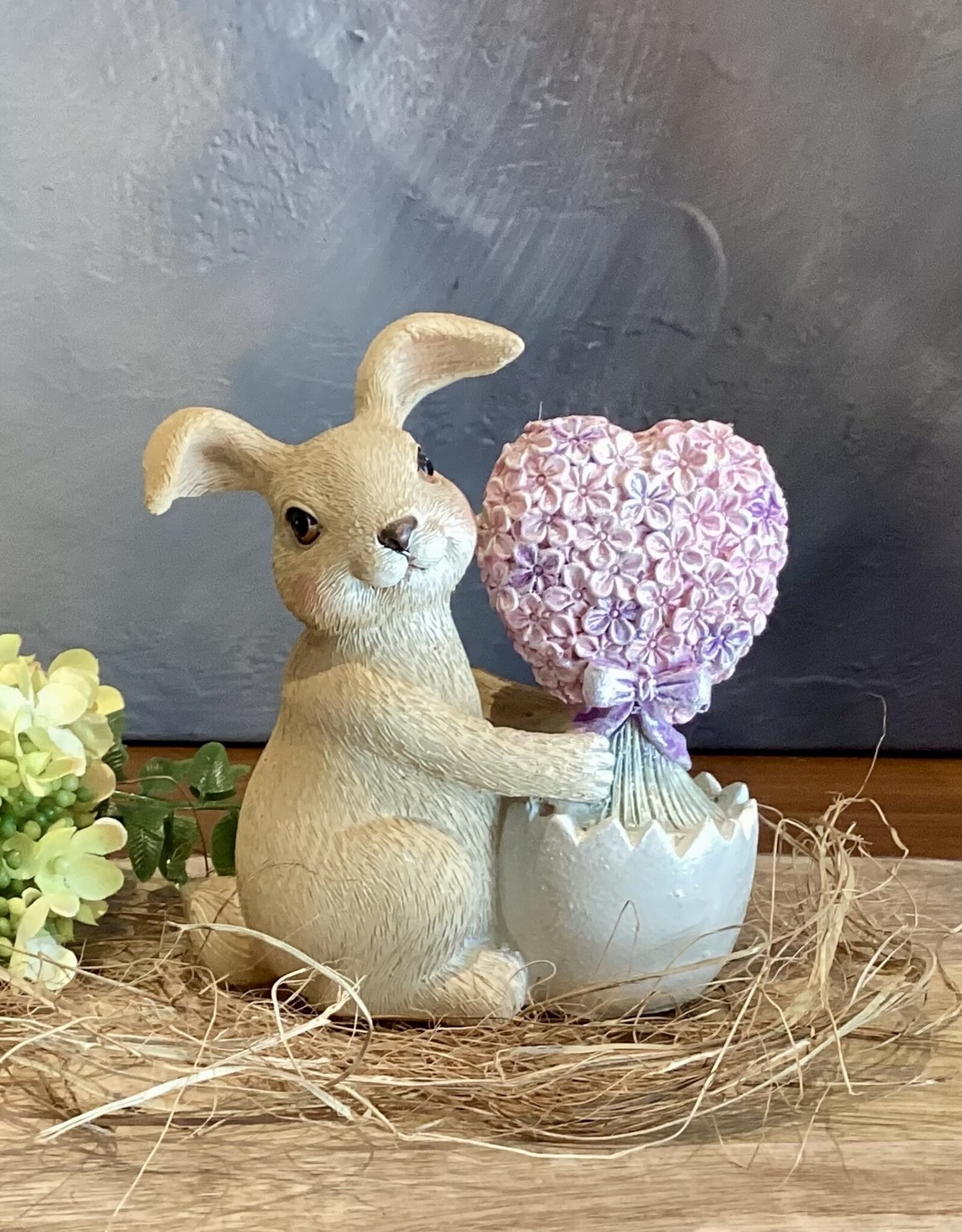 Lapin au coeur de fleurs roses