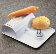 Groentenschraper op voet met fixatienagels