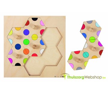 Honingraat inlegpuzzel met gekleurde cirkels