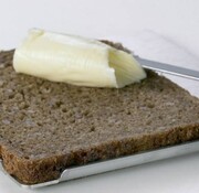 Boterhamplankje met opstaande rand in rvs (roestvrijstaal)