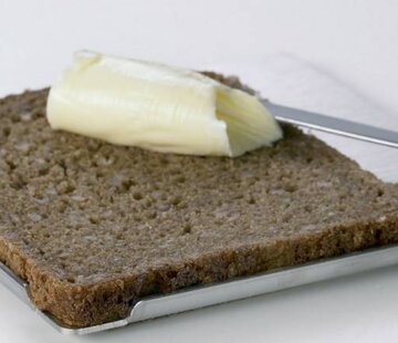 Boterhamplankje met opstaande rand in rvs (roestvrijstaal)