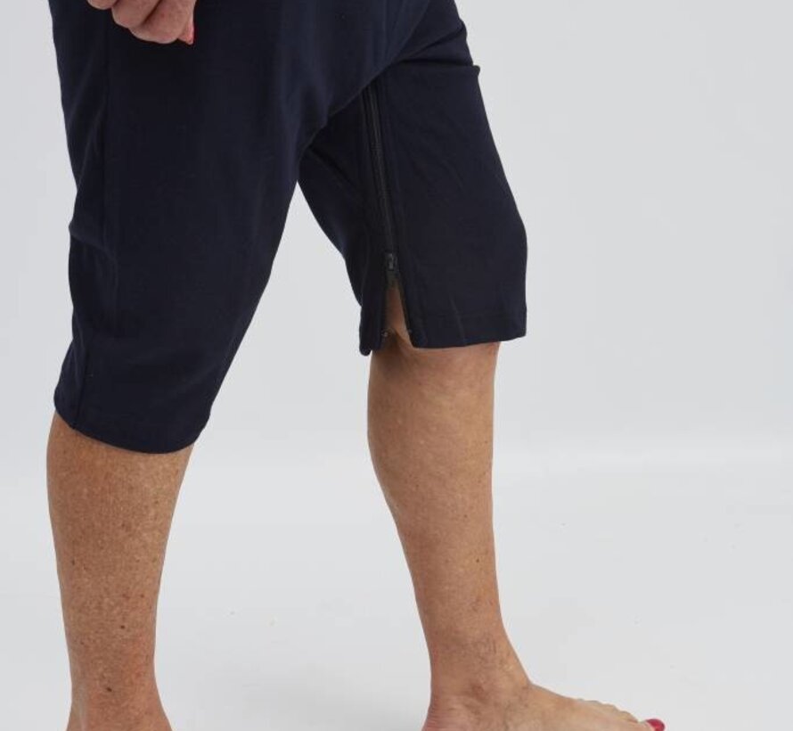 Marine blauwe polo met ritssluiting tussen de benen