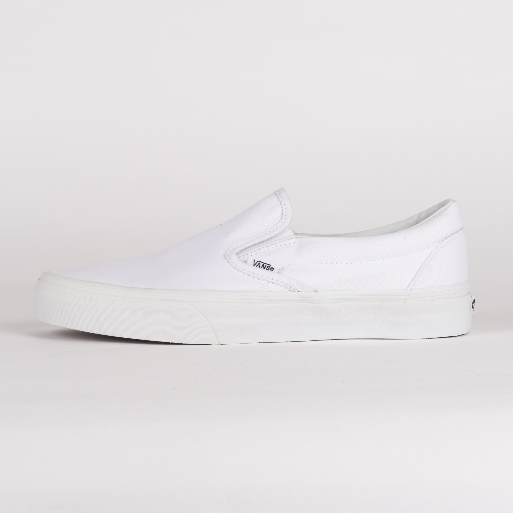 vans slip on true white