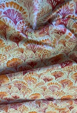 Etnische Palmbloemen in opvallend roze en oranje tinten.