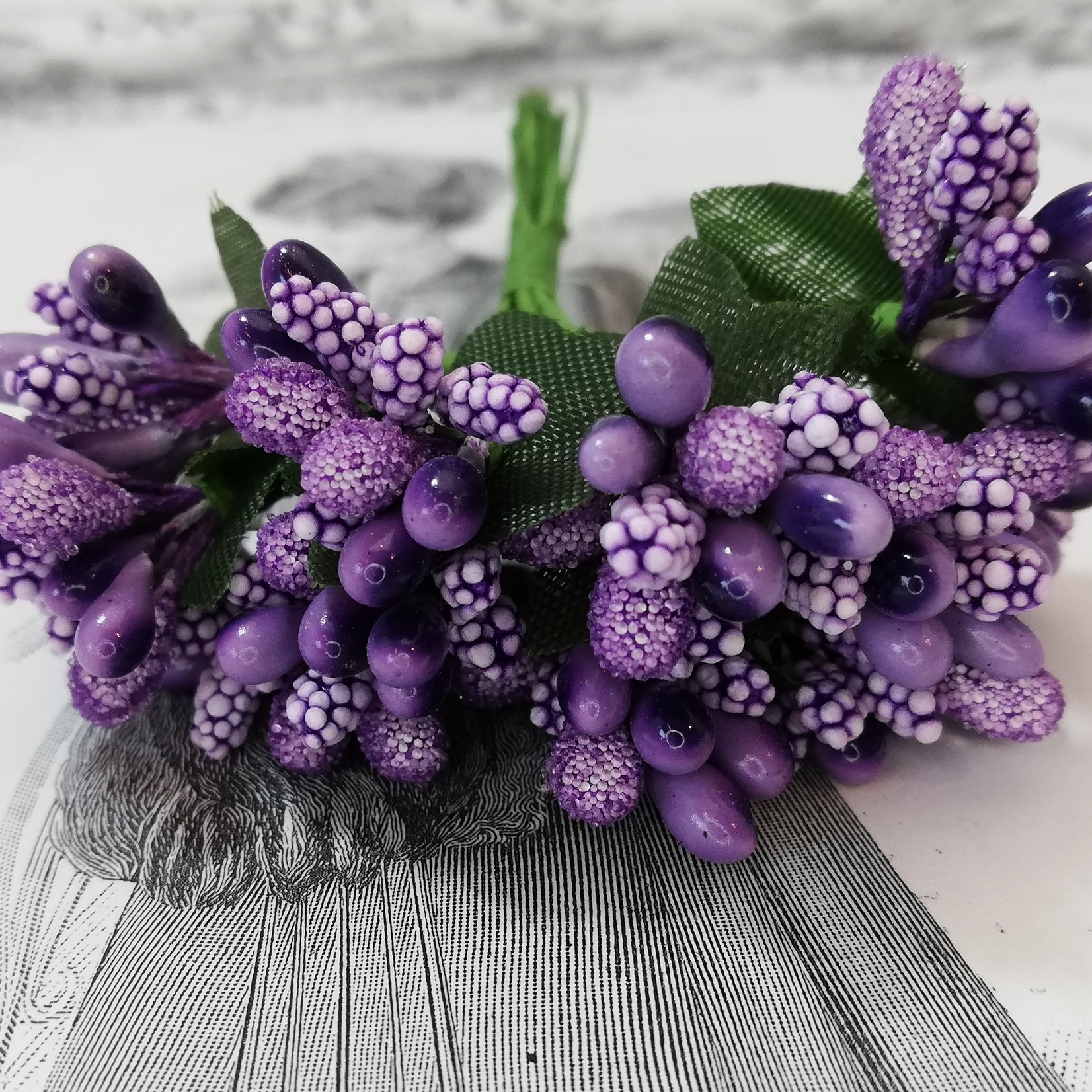 Little posy of berries in different colors.