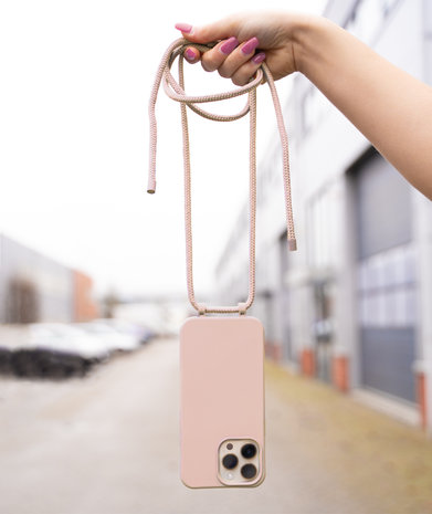 Coverzs Coverzs Silicone case met koord iPhone 14 Pro (roze)